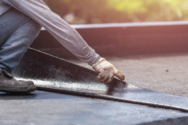 Professional Basement Waterproofing technician working in Broadway, OH